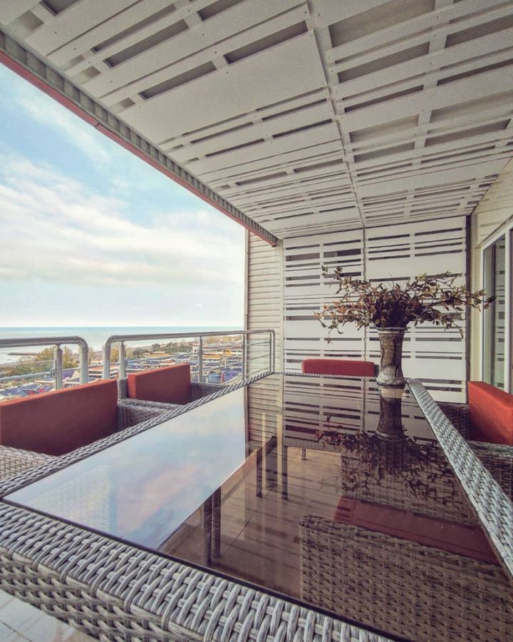 a table in the balcony, renovation of a unit in tavoos tower